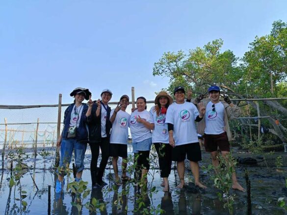 Digido Finance Corp. volunteers promote coastal resilience, biodiversity restoration by planting over 1,000 mangroves at Bataan